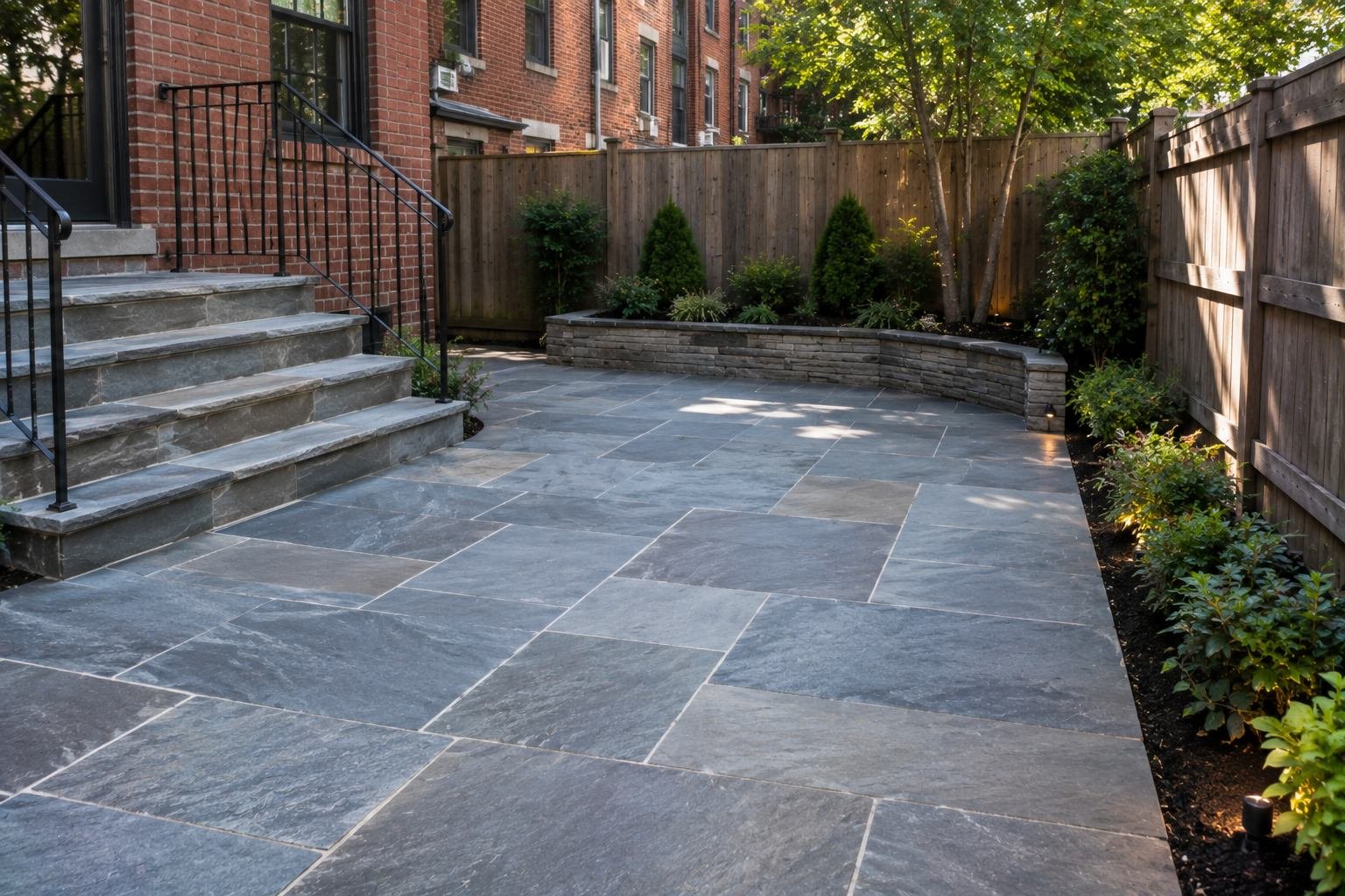 Bluestone flagstone patio installed in a Bronx backyard